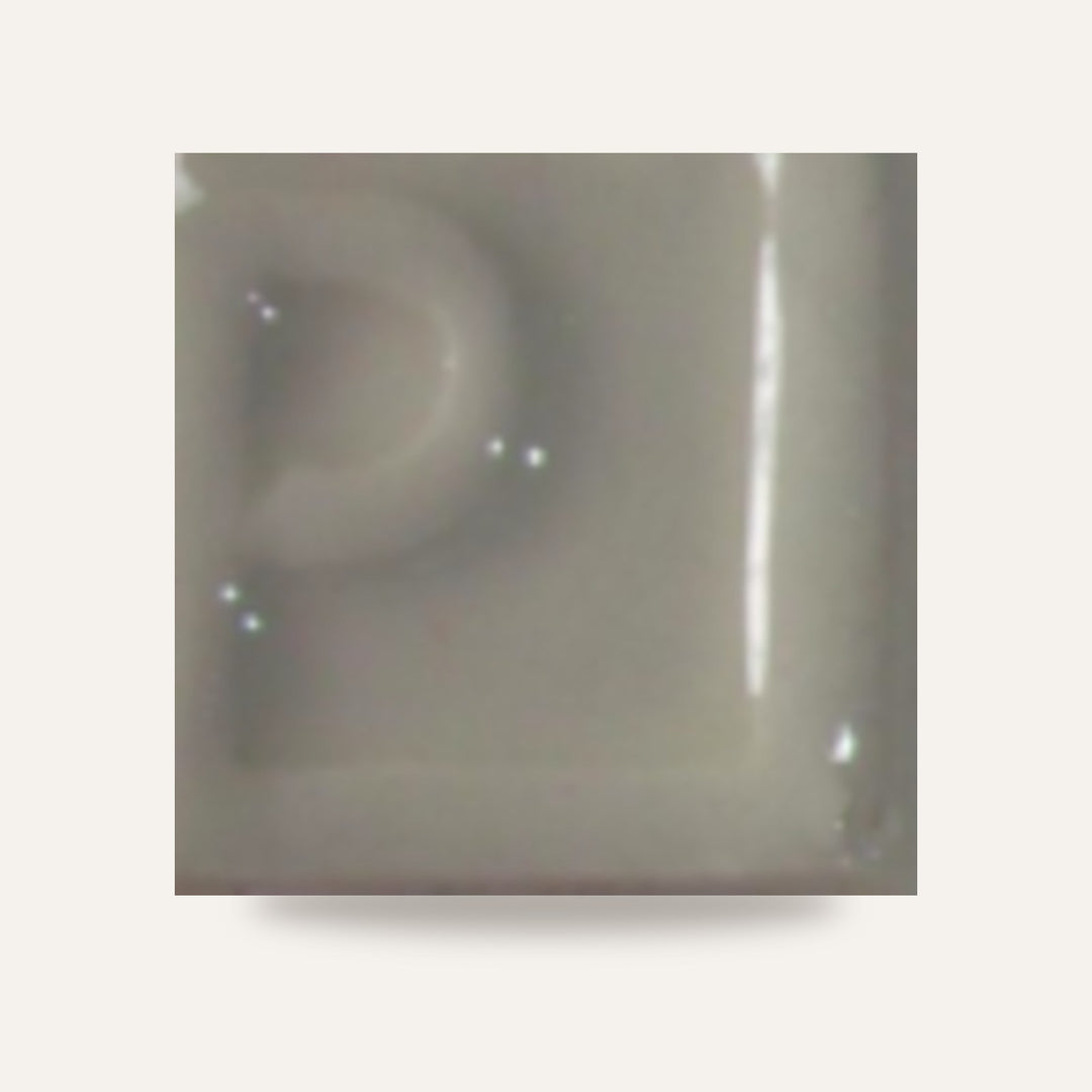 GRES O-301 TRANSPARENTE BRILHANTE — amostra cozida